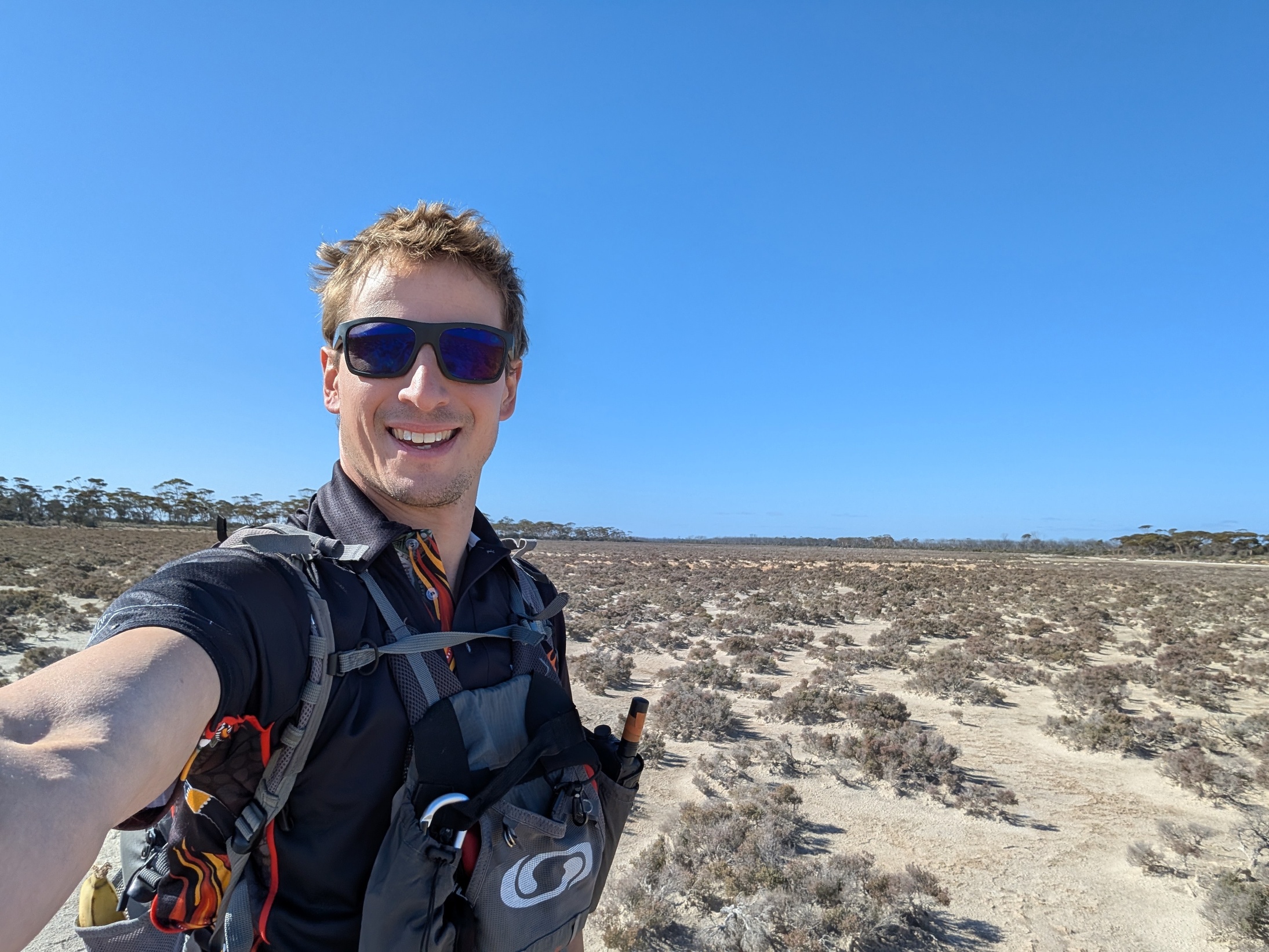A happy team leader with space rock ballast in his bag.